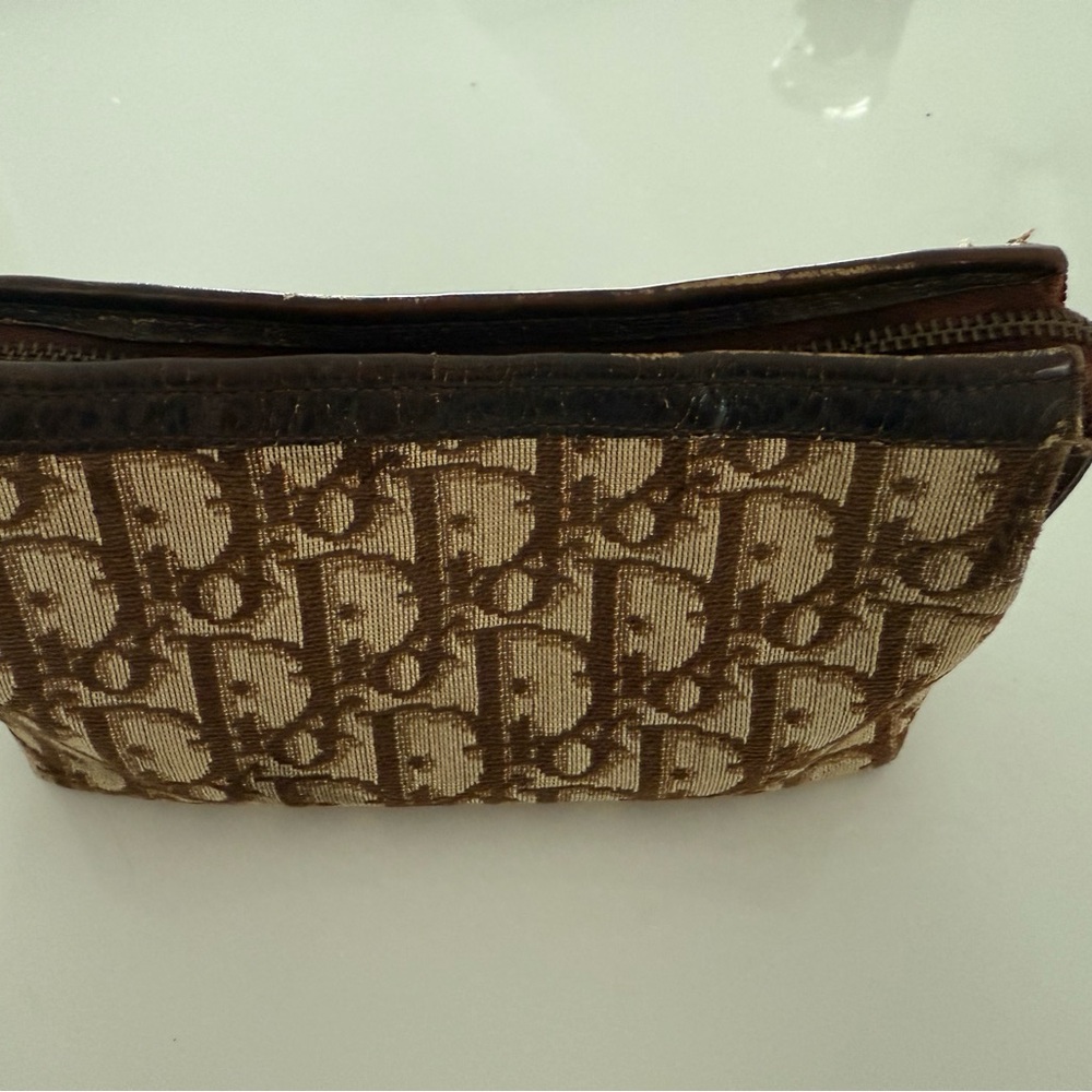 Elegant Christian Dior zippered cosmetic case.